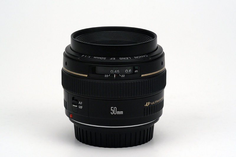 Canon EF 50mm F1.4 USM Side View showing full extension, model name inscriptions, focus scale