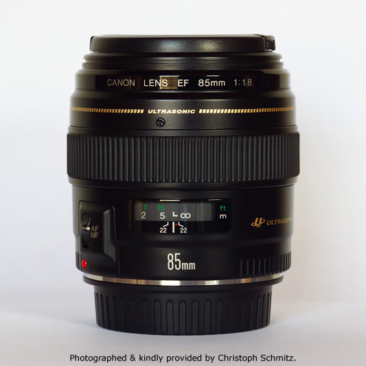 Canon EF 85mm F1.8 USM Side View showing model name inscriptions and focus scale