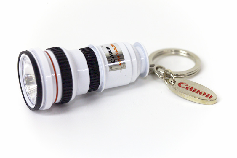 Canon OIS Lens Flashlight Keychain side view left