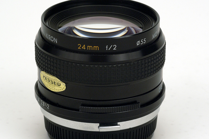 Kiron 24mm F2.0 MC Side View showing model name inscriptio and filter size