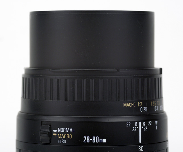 Sigma AF 28-80mm F3.5-5.6 Aspherical Macro for Canon EF Side View showing full zoom and focus extension and focus limiter